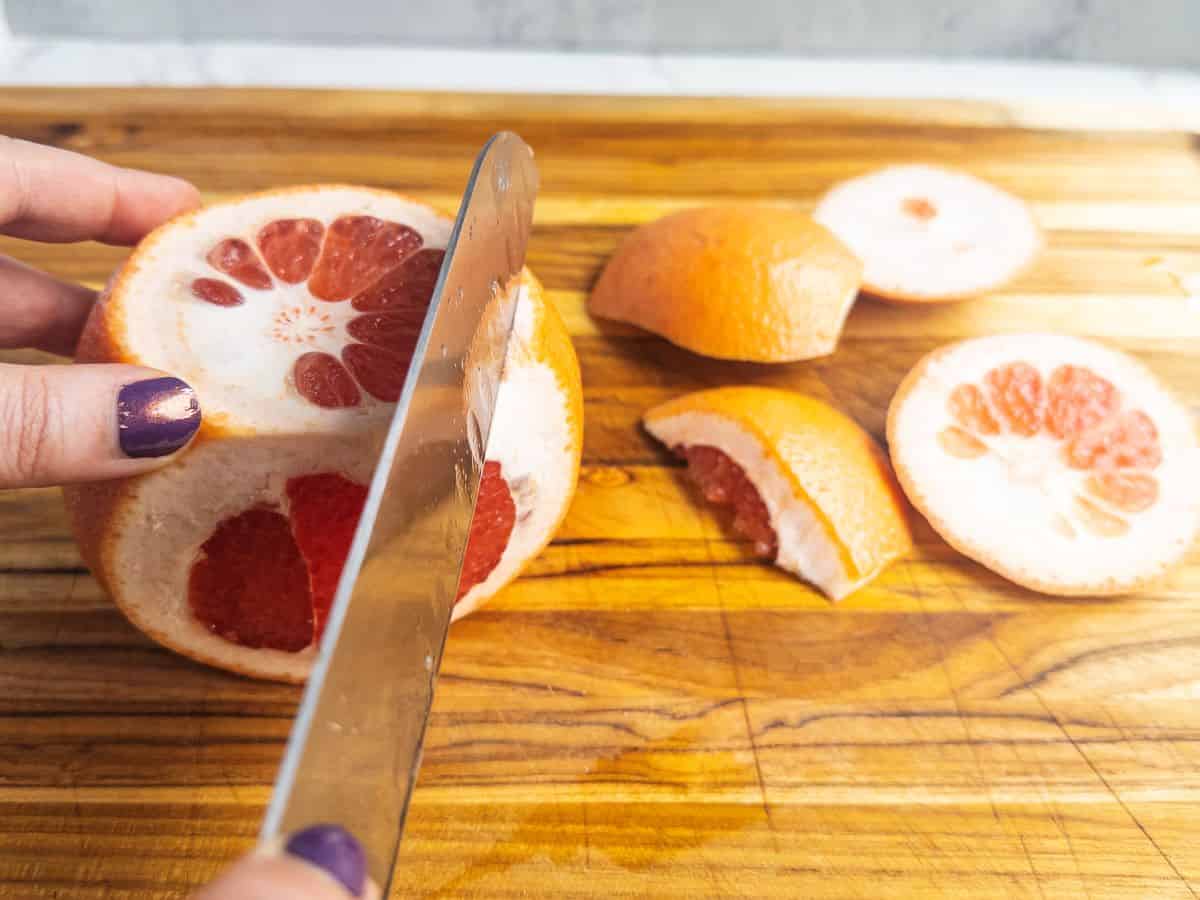 slicing-peel-from-grapefruit-on-cutting-board