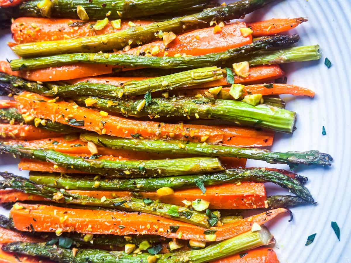 roasted carrots and asparagus close up on a plate
