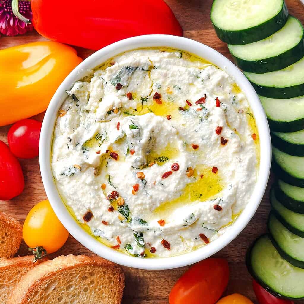 Whipped ricotta dip surrounded by crudités.